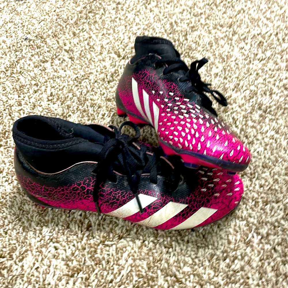 Pink and black kids adidas soccer cleats